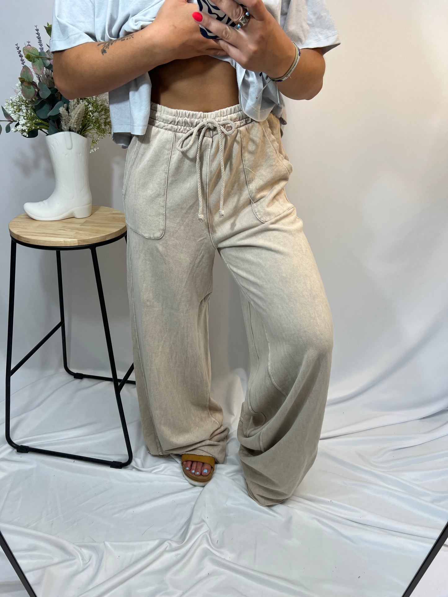 Wide leg mineral wash beige lounge pants with raw hem and drawstring waist – perfect for casual and comfy days