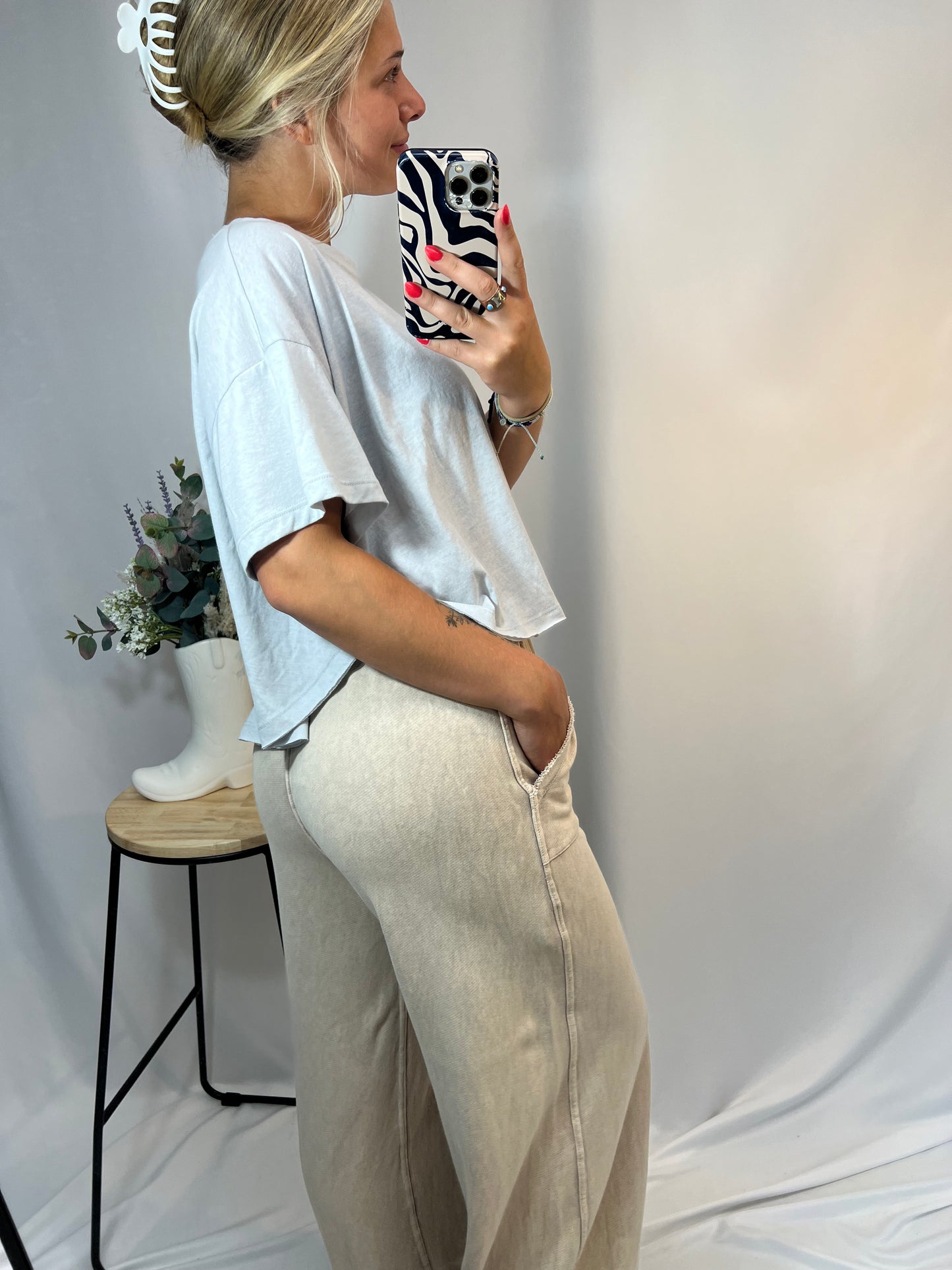 Neutral beige wide leg sweatpants styled with oversized tee – cute outfit idea for laid-back days