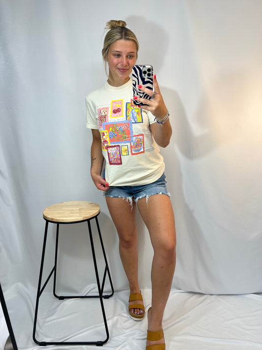 Girl wearing Fruit of the Spirit graphic tee in natural color – Comfort Colors Christian shirt with vintage stamp artwork, styled with denim shorts