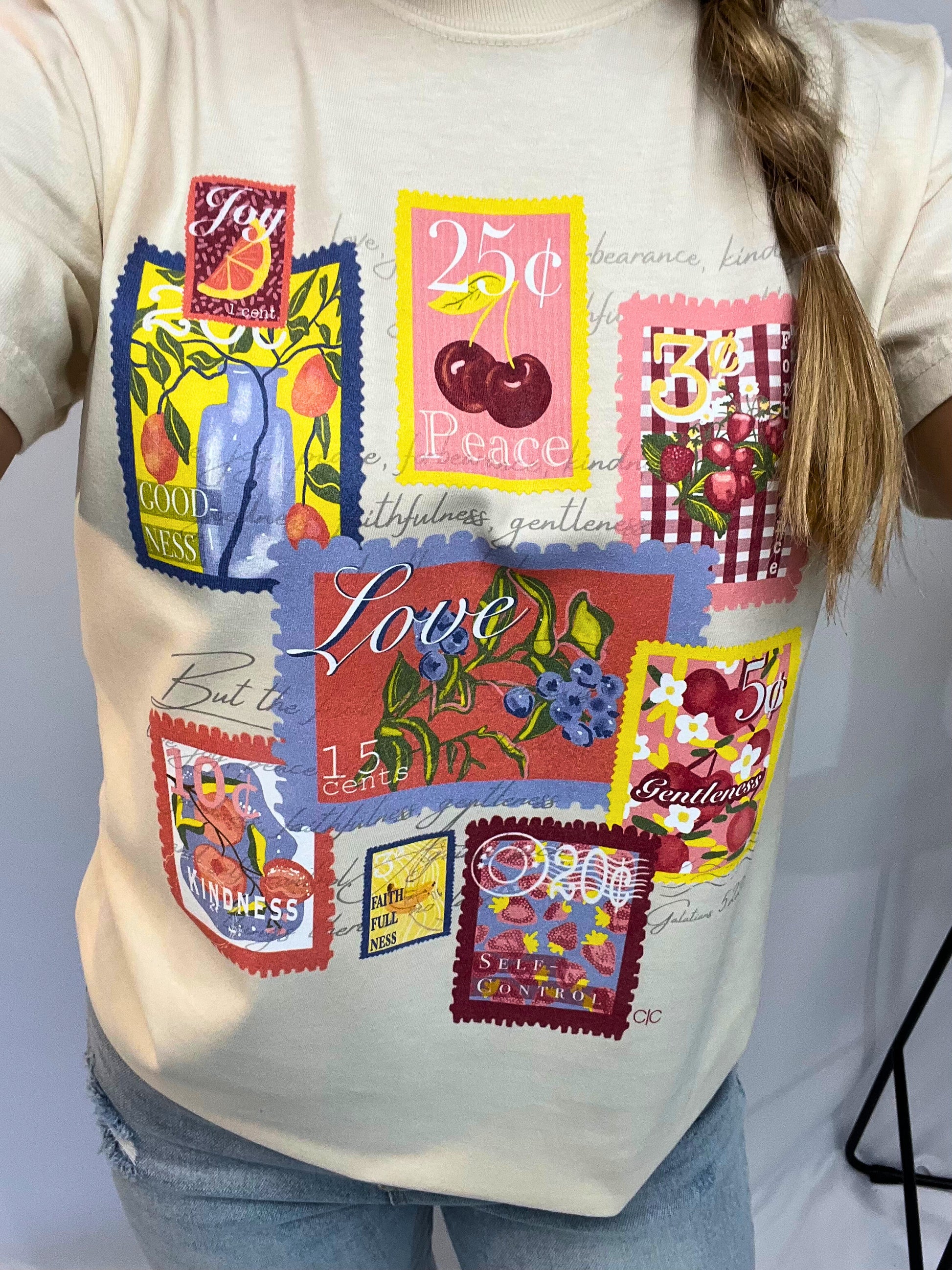 Close-up of Fruit of the Spirit Christian t-shirt design – hand-drawn stamps illustrating Galatians 5:22-23, perfect cute faith-based tee for girls